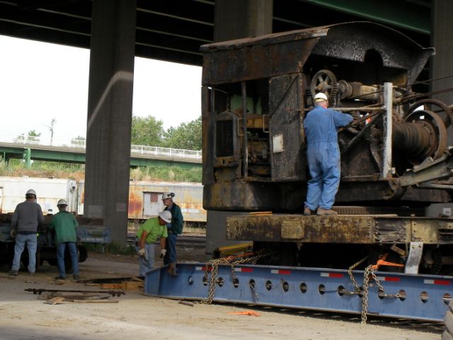 manually lowering crane boom